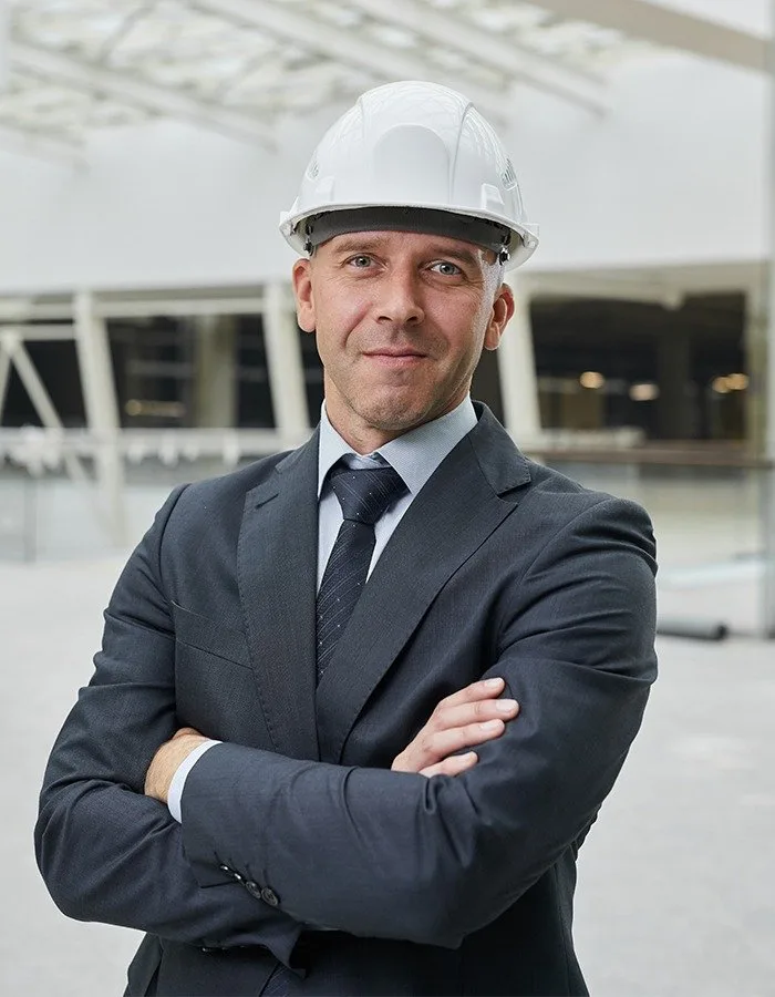 Civil engineer in suit and white safety helmet – Prospect Infraworld Bhopal