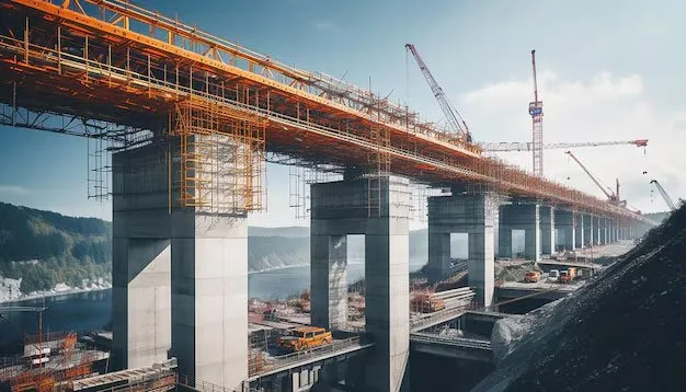 Large bridge under construction with cranes and formwork – bridge construction consultancy