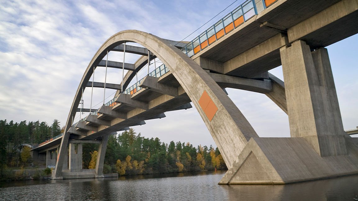 Concrete arch bridge over a river designed to IRC standards