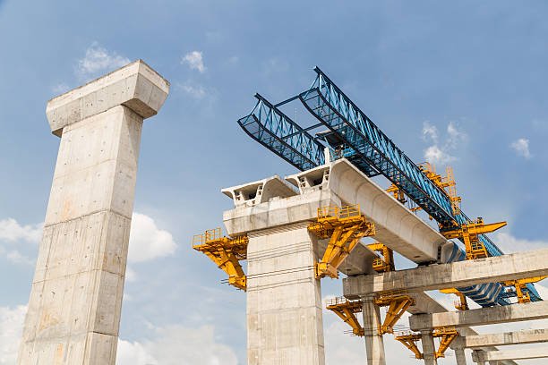 Bridge pier and girder launching at a highway bridge construction site